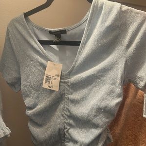 Blue sparkly glittery top